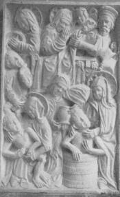 MAGYARORSZ�GI SZENT ERZS�BET B�LPOKLOSOKAT MOSOGAT.DOMBORM� A KASSAI SZ�KESEGYH�Z KAPUJA F�L�TT (XV. SZ�ZAD)